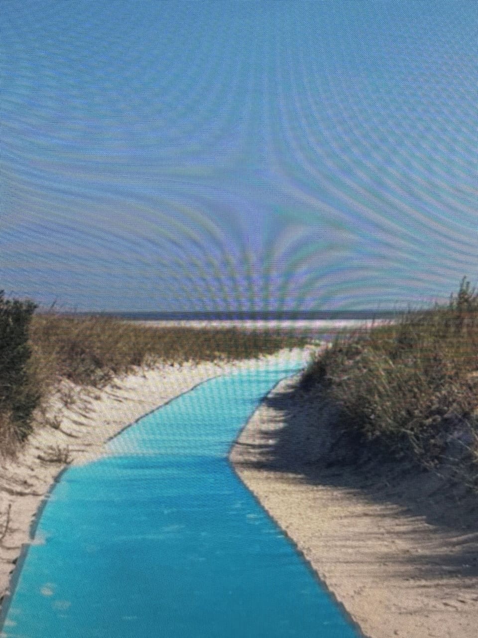 Path to beach next to 2 dedicated parking spaces outside of the condominium
