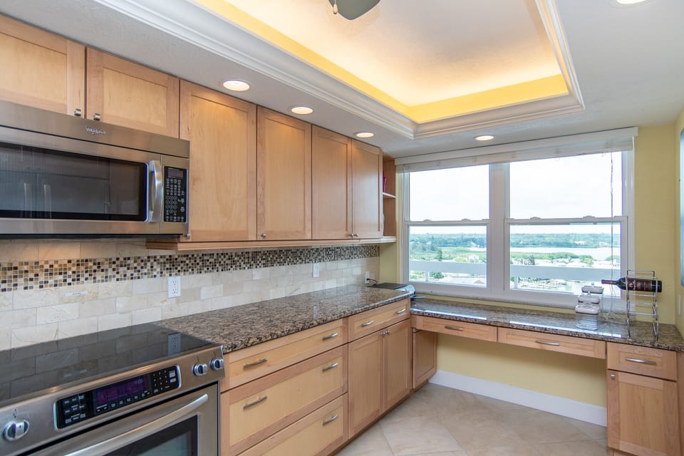 Inter coastal views enhance the well stocked kitchen. 
