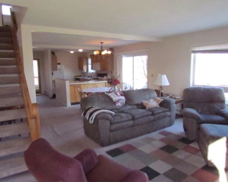 View from sunroom. Stairs leading to second floor.