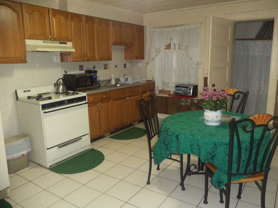 kitchen with microwave,coffee pot & toaster oven.