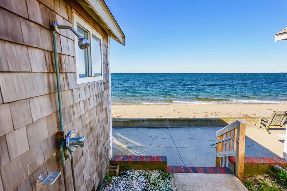 Front entrance.  Three steps down to deck.