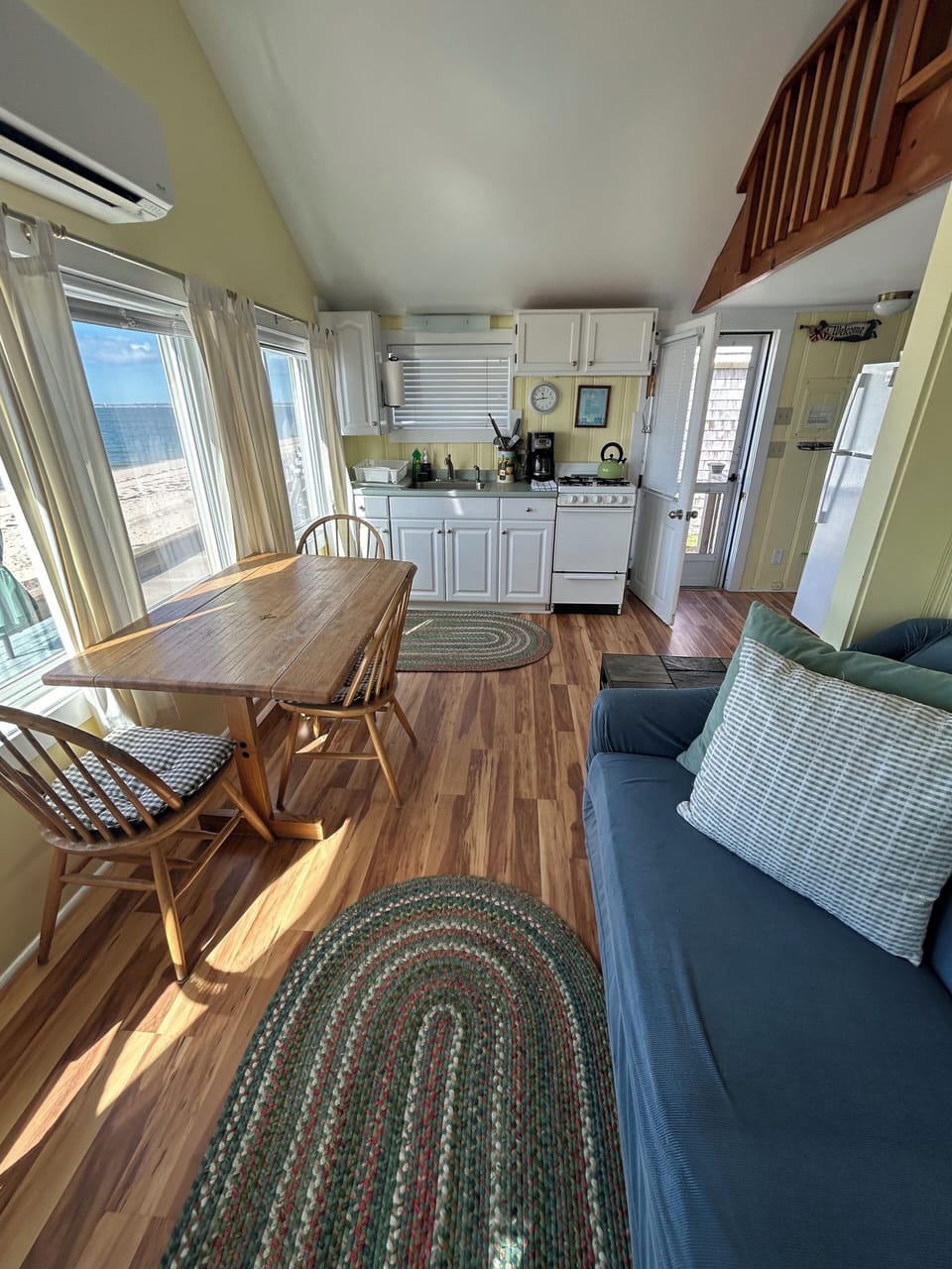 View of kitchen area from couch.
