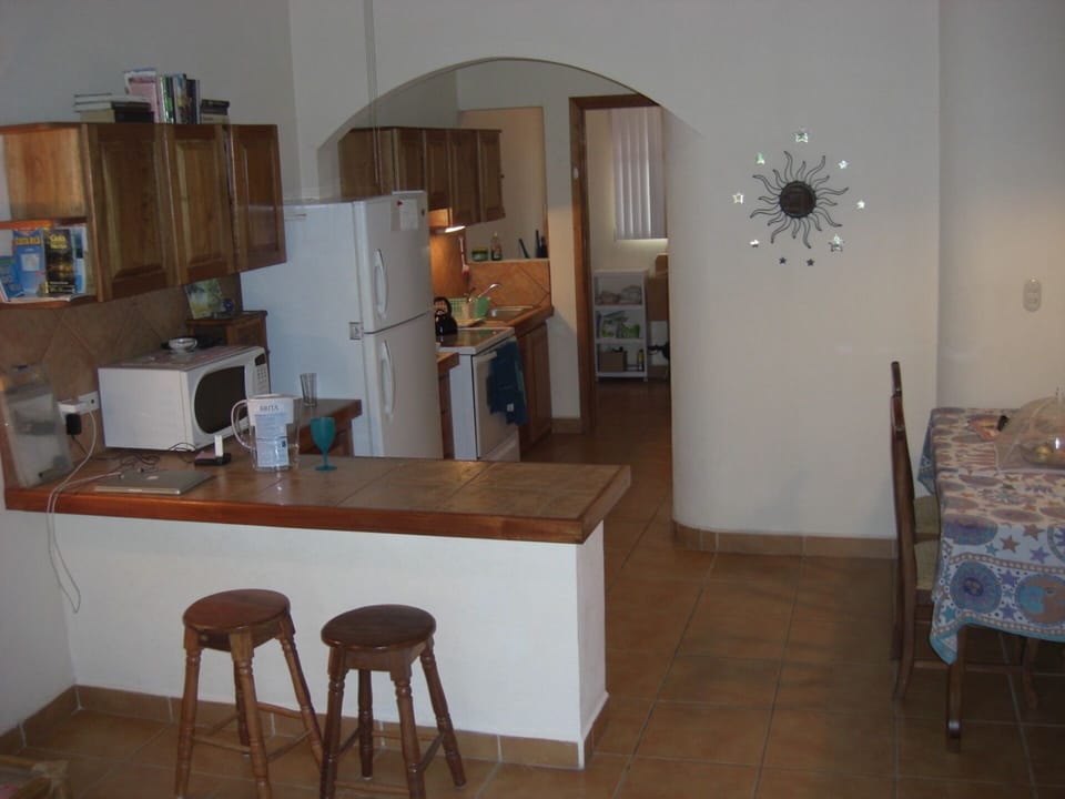 dining area & kitchen, laundry room at back
