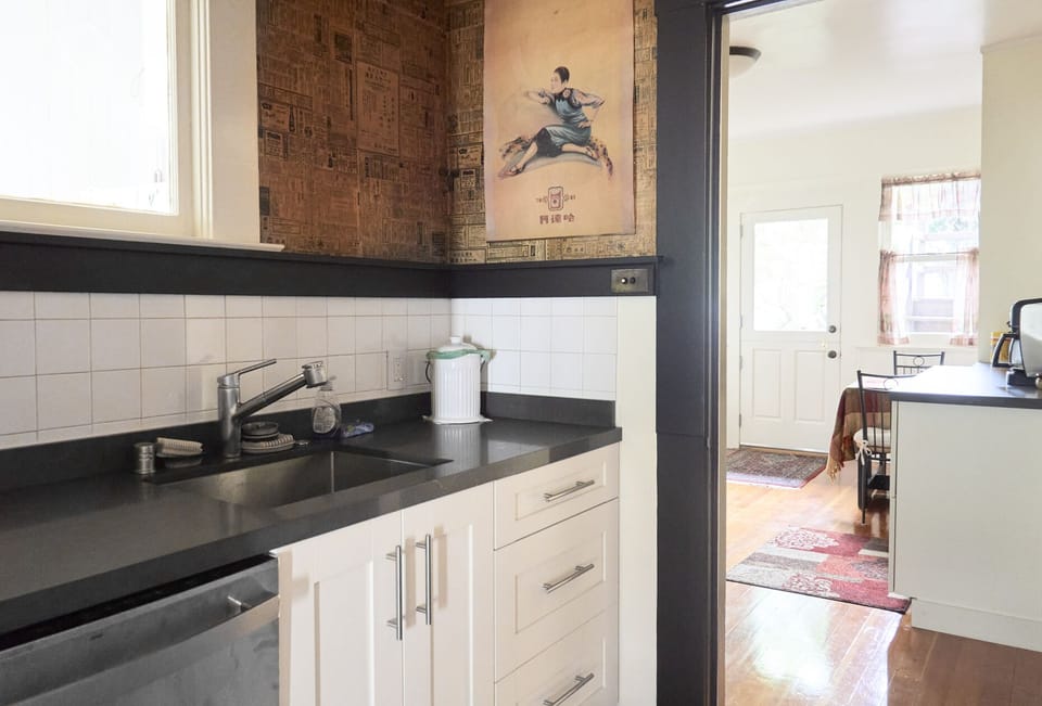 Sink area leading into kitchen