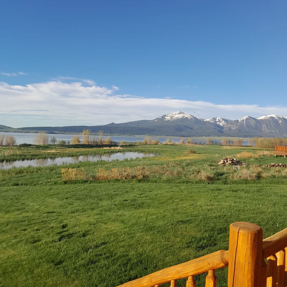 Snow-capped mountains on both sides in May, Sept, or Oct. This spot is a gem.