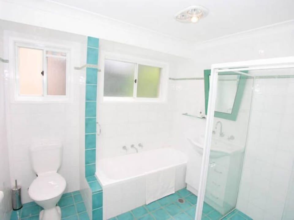 Bathroom with large bath and standalone shower