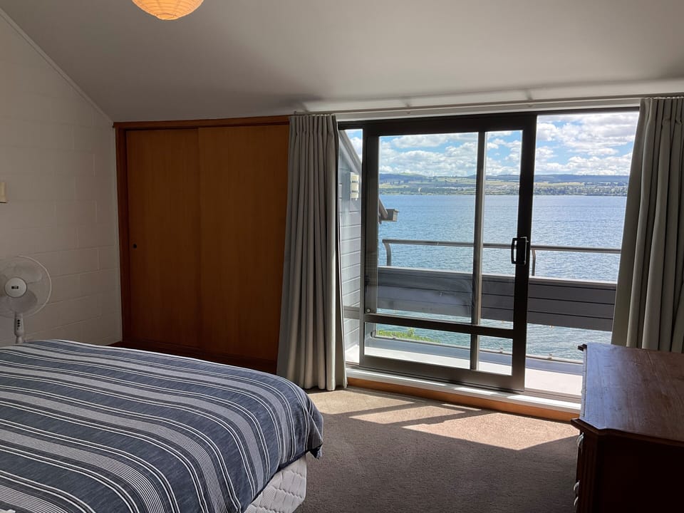 King bedroom with small balcony
