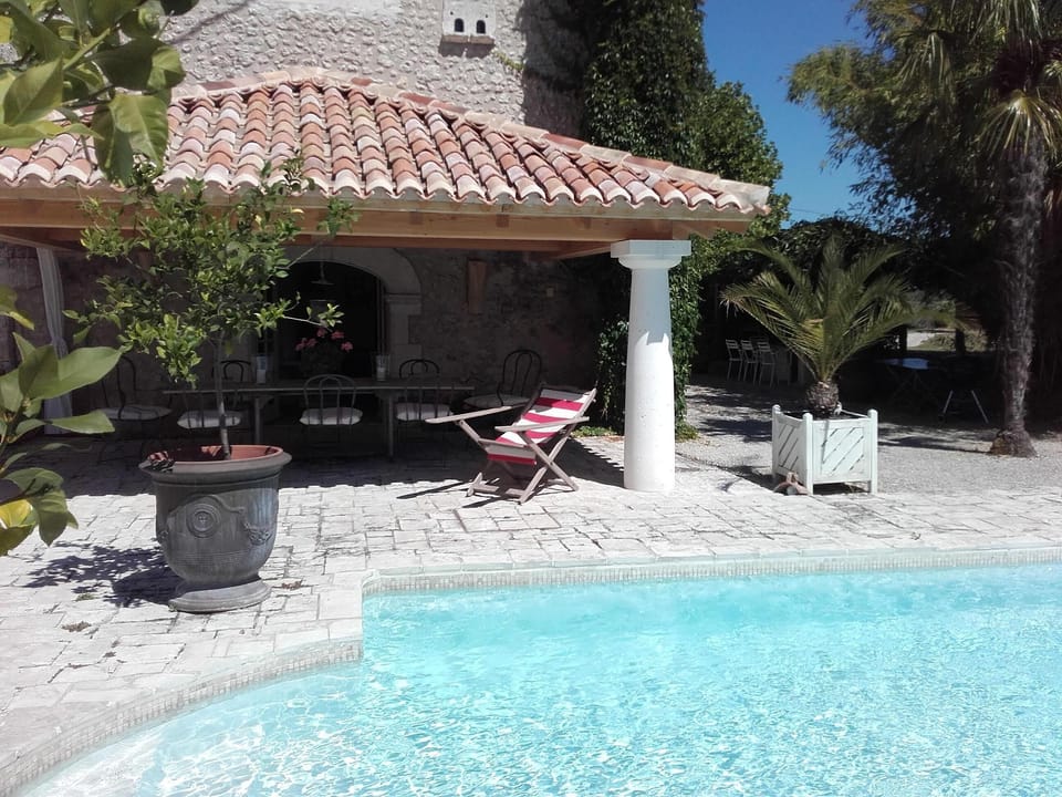 Covered terrace beside pool