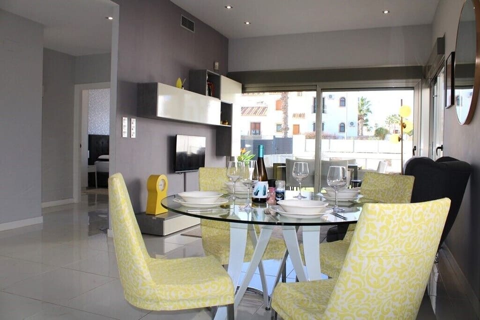 Lounge diner looking out onto patio and pool