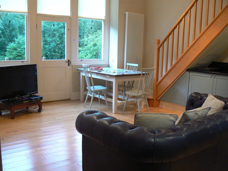 The Playroom leads out onto the side lawn, where there is a barbecue.