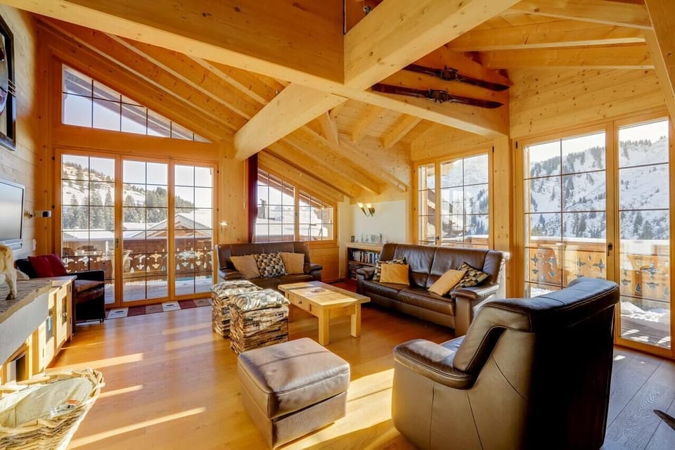 The bright and spacious living room with commanding views of the area