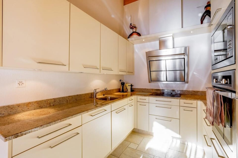 The kitchen is very well equipped with a Nespresso machine, fondue and raclette