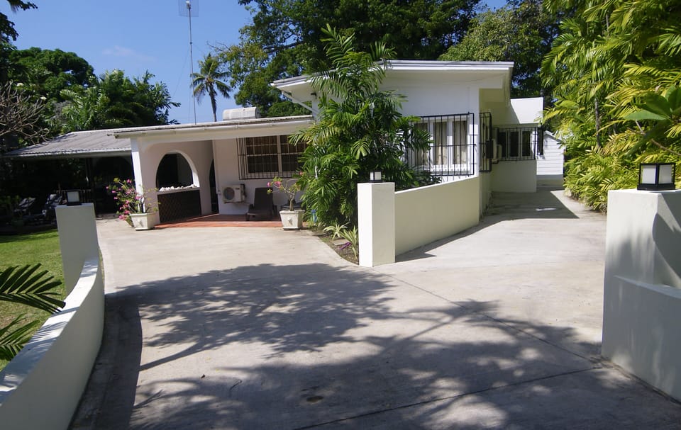 Smart, spacious drive leads to a generous car port.
