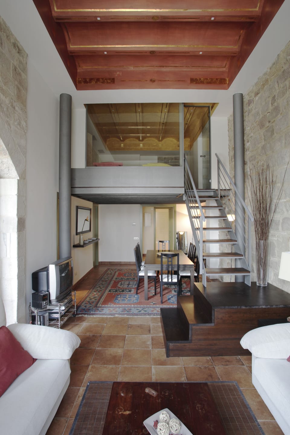 Genral view of living and dinning room and double room of the upper floor