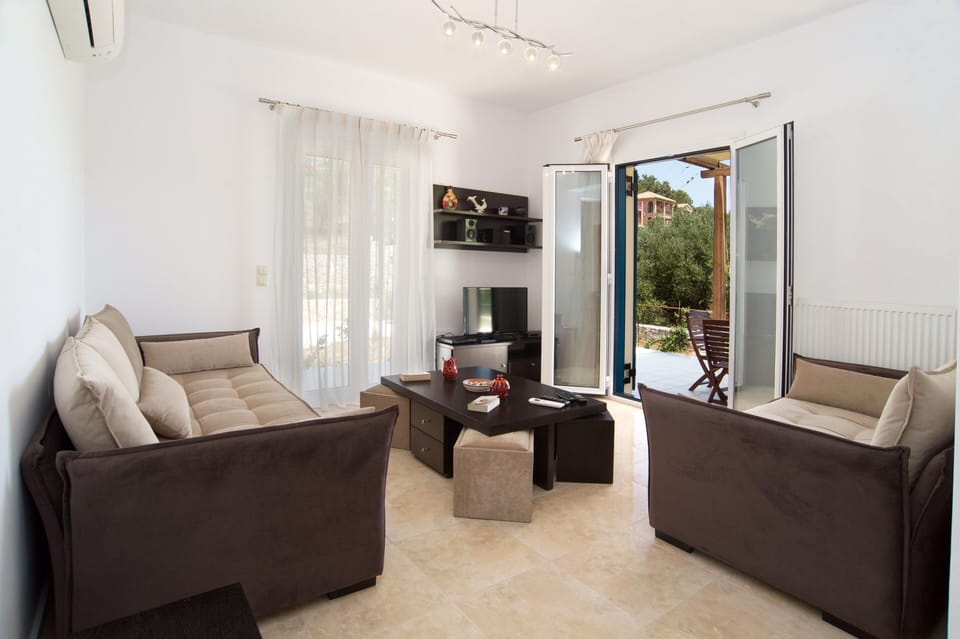 With a modern comfortable living room with sofa bed sleeping 1 additional person