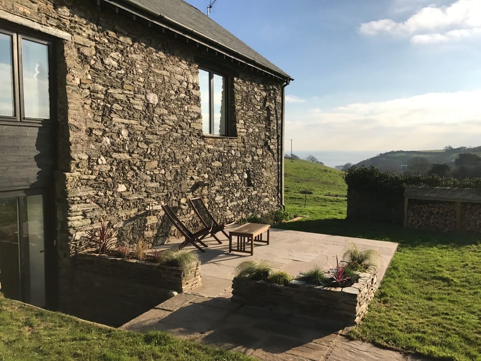Garden terrace with view to the sea for afternoon sun