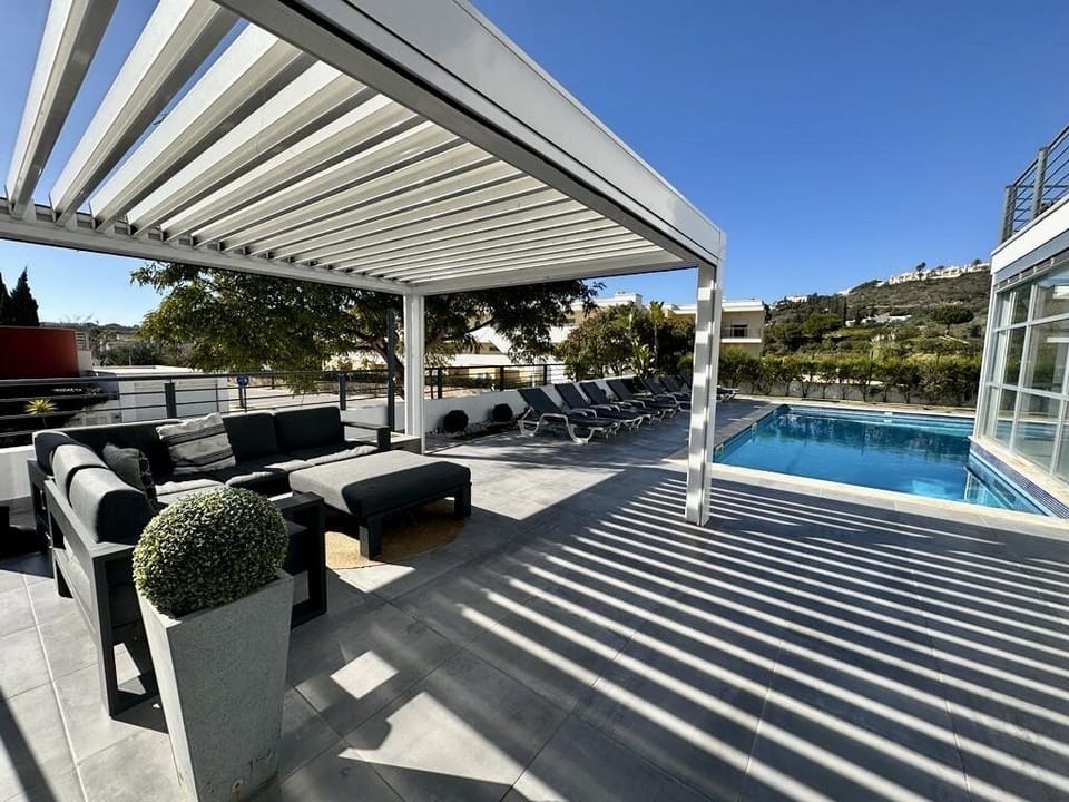 Pool and undercover relaxed seating area