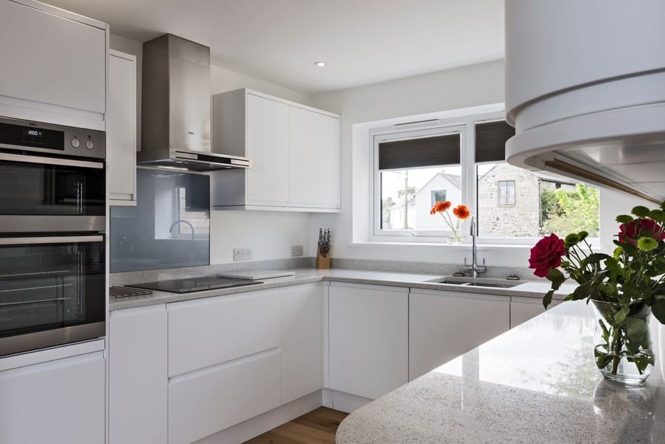 Kitchen - Double oven, Induction Hob.  Integrated dishwasher and washer/dryer