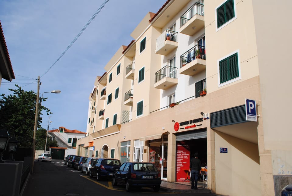 View of apartment block from street level