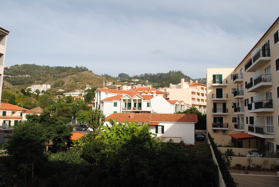 View from behind apartment to the hills