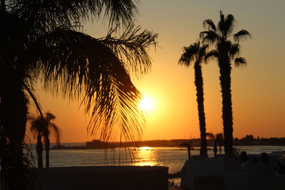 Sunset over Paphos Harbour