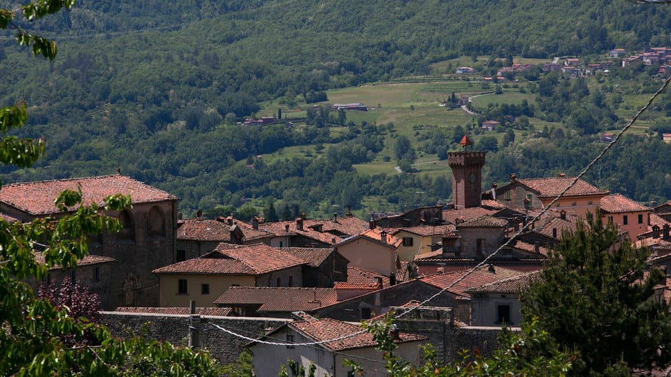 View to Castiglione village rooftops and tower