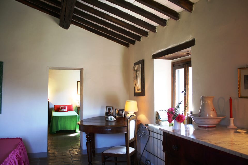 one of the doors to the single beds room