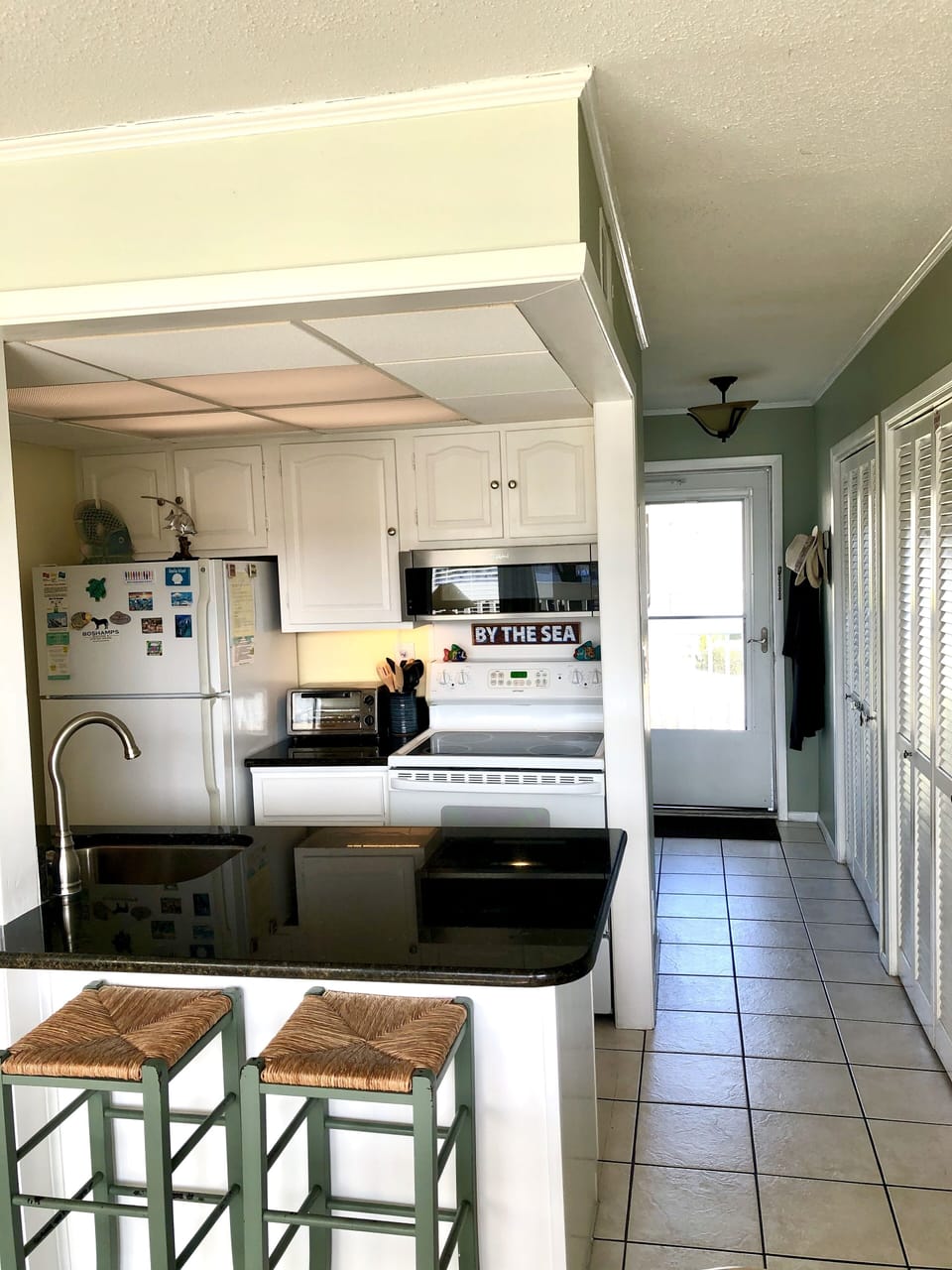 Kitchen and front hallway/entrance  