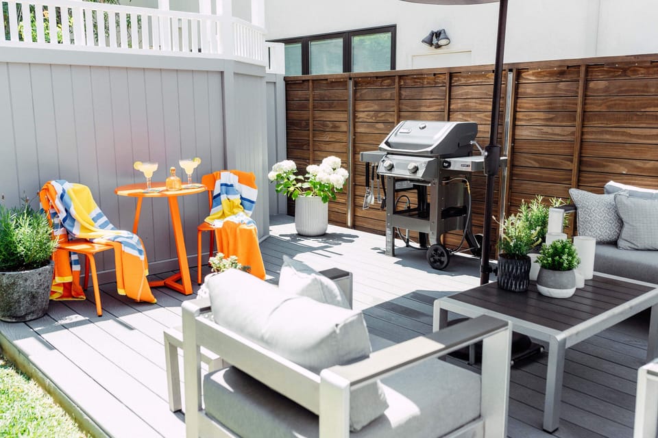 New Weber stainless steel Gas BBQ, comfy seating & eating area, plus grassy area