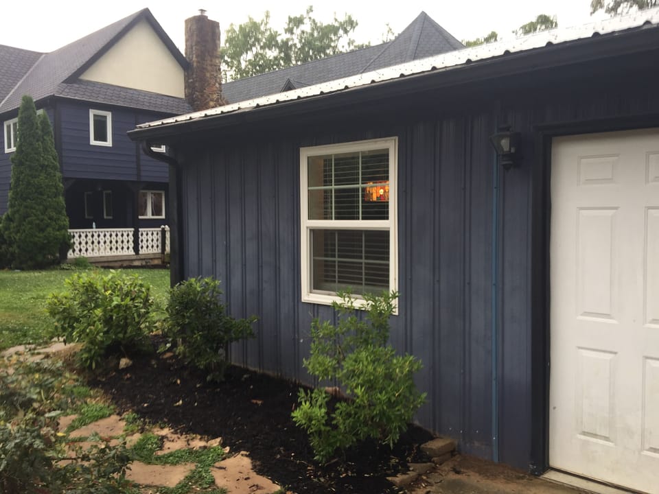 Studio Suite with main house in the background.