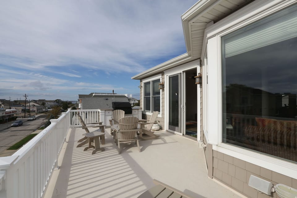 3rd floor deck, grill and seating area