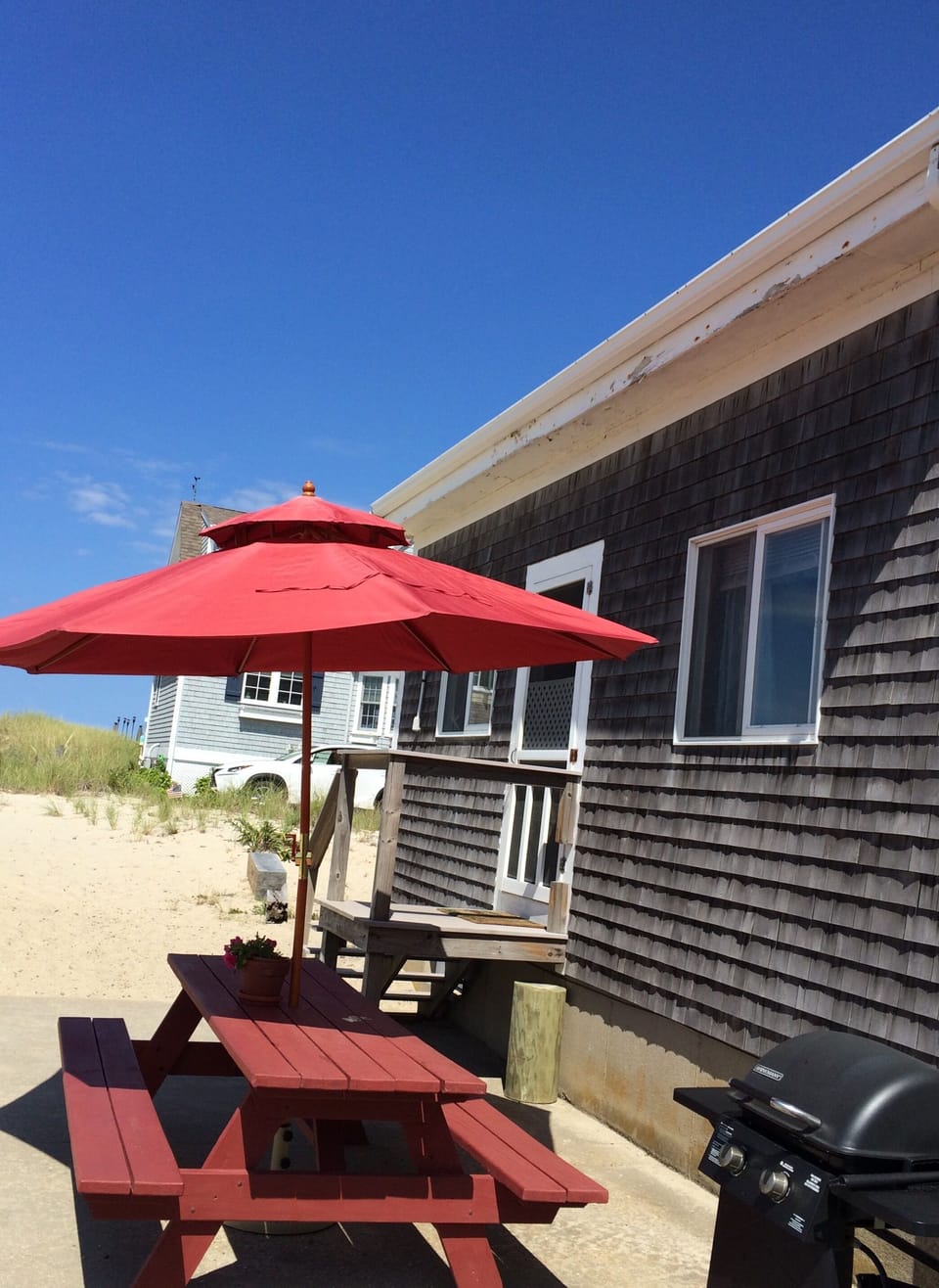 Picnic Table, Umbrella and Grill on Patio. Beach is right over the dune.