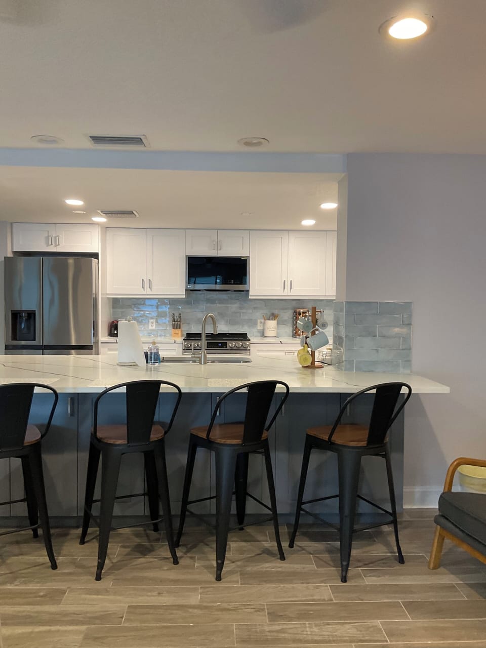 Bar seating at large island counter.