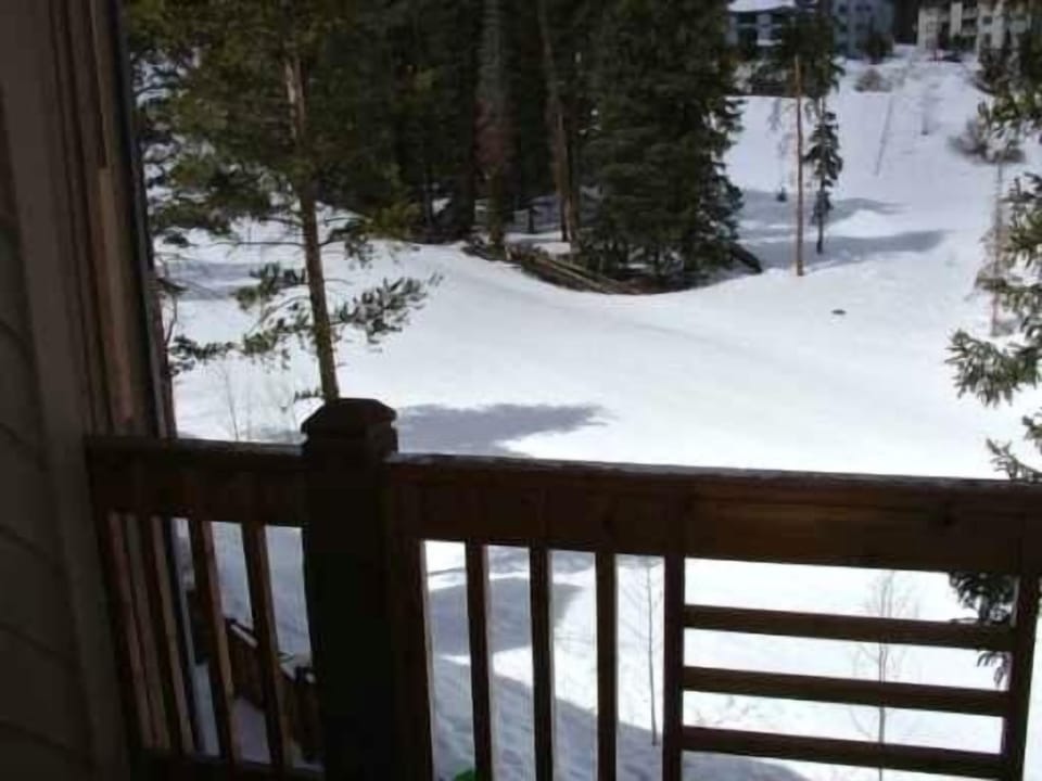Our deck overlooking 4 O'Clock Ski Run - True Ski In Ski Out Access!