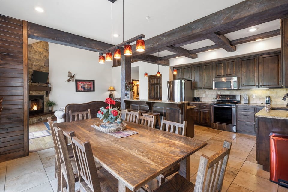 Open kitchen and dining with seating for 8 at the table