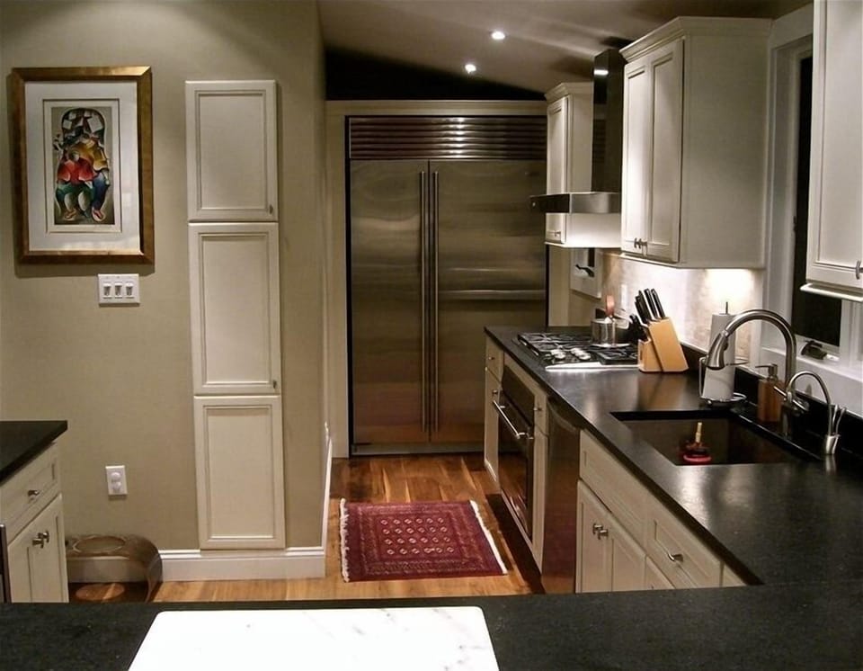 Chef's kitchen-staninless steel, gas range, stone counters. Completely equipped.