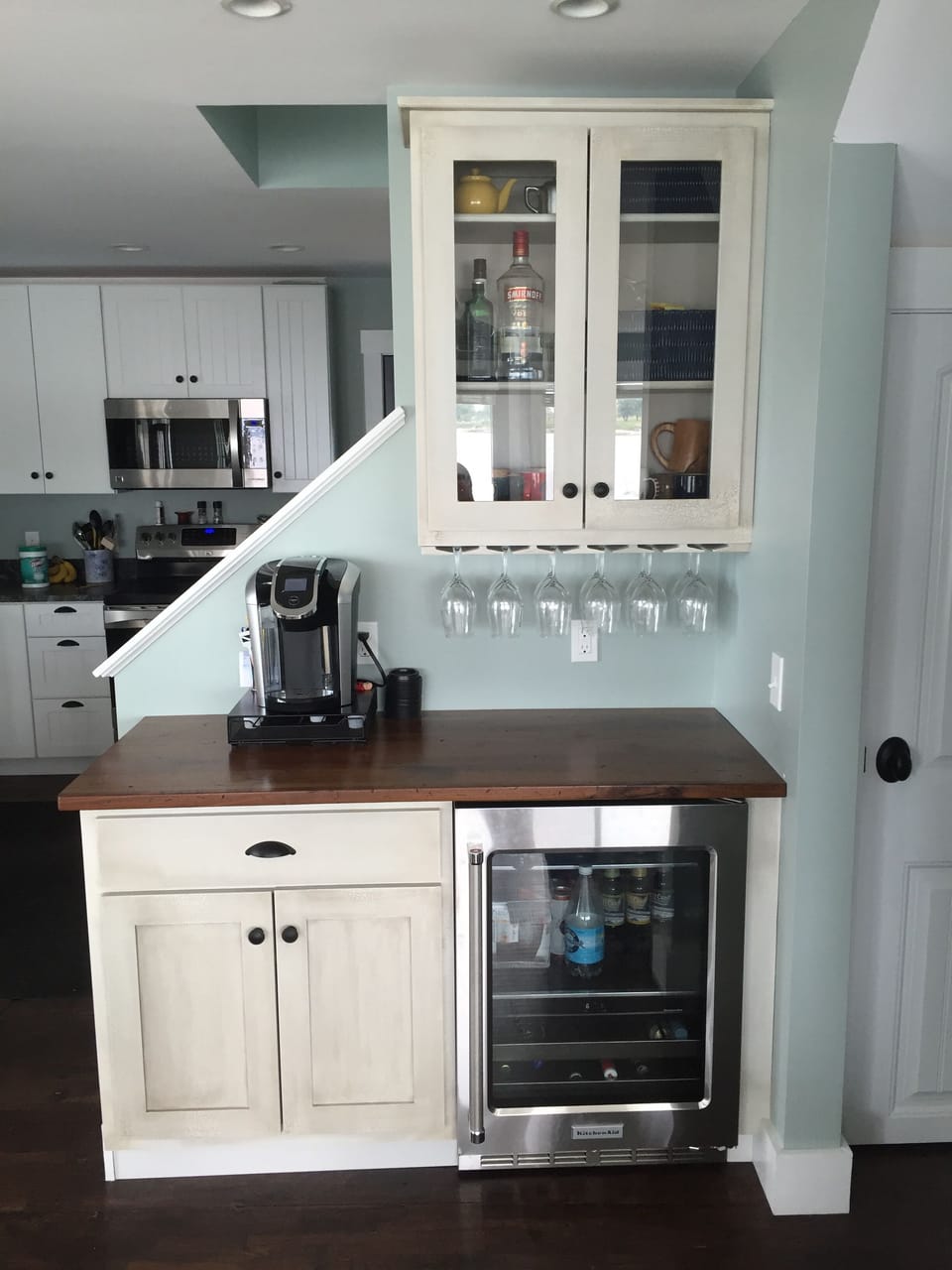 Coffee bar with beverage fridge. 