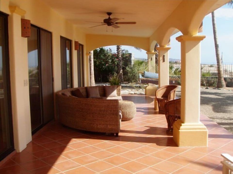 The front veranda at Casa de Las Palmas - to sit, sip, and enjoy the sea & beach