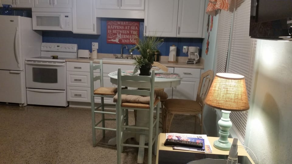 stylish high top table with comfortable seating.