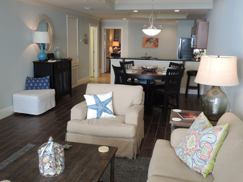 View of living room into dining and kitchen
