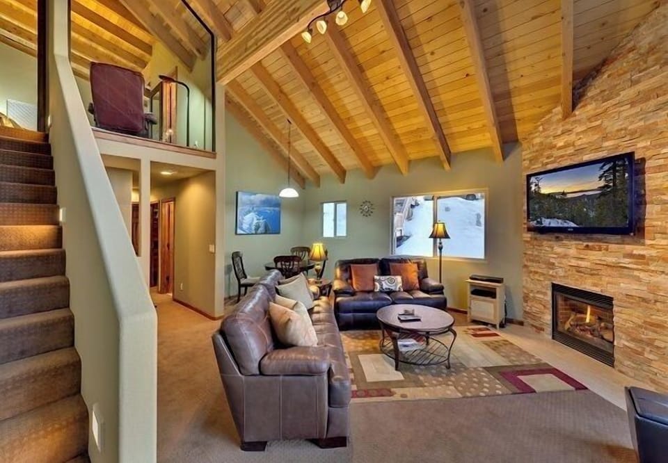 2nd Floor Den: Vaulted ceilings with exposed natural wood. Stairs to loft MBR #2