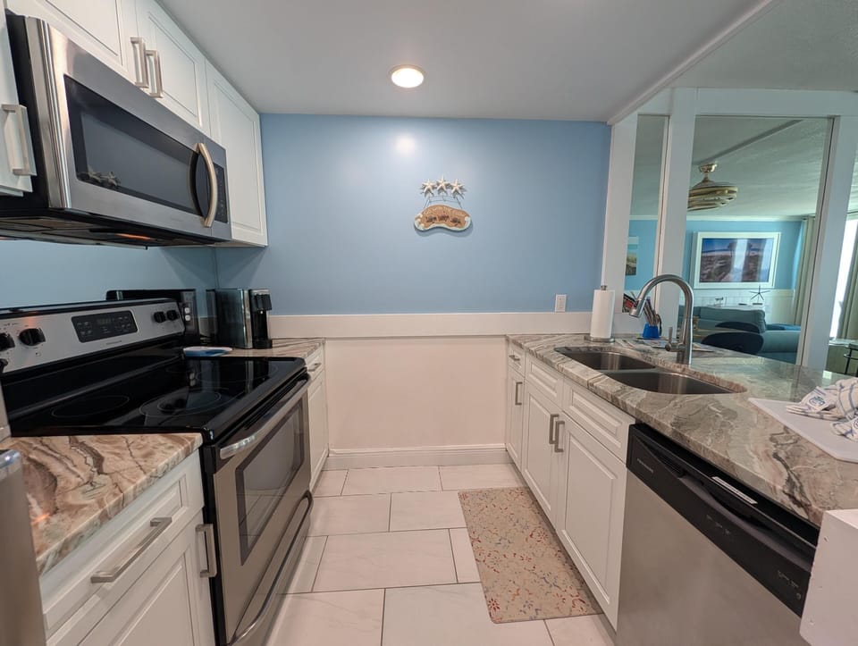 Bright, modern kitchen with sleek stainless steel appliances