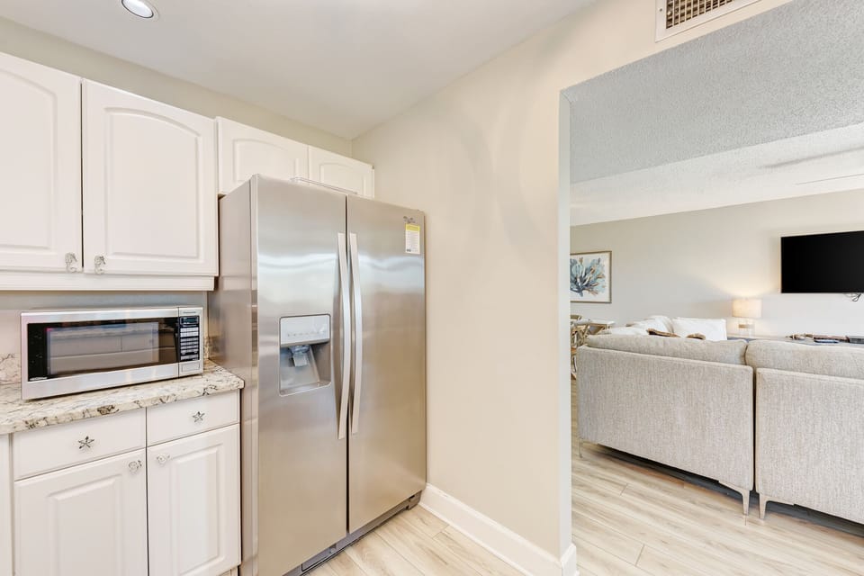 Talk to family & guests, watch TV while in the kitchen...