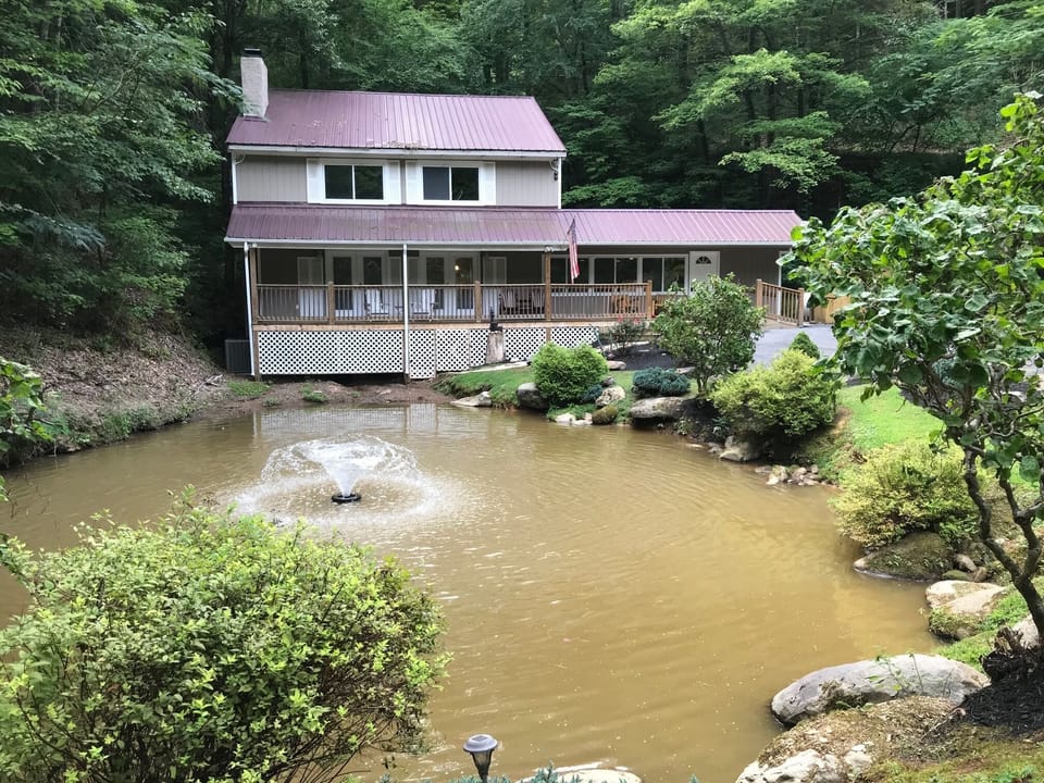 Seclusion, privacy, private fish pond, located on 4 acres in a gated community!
