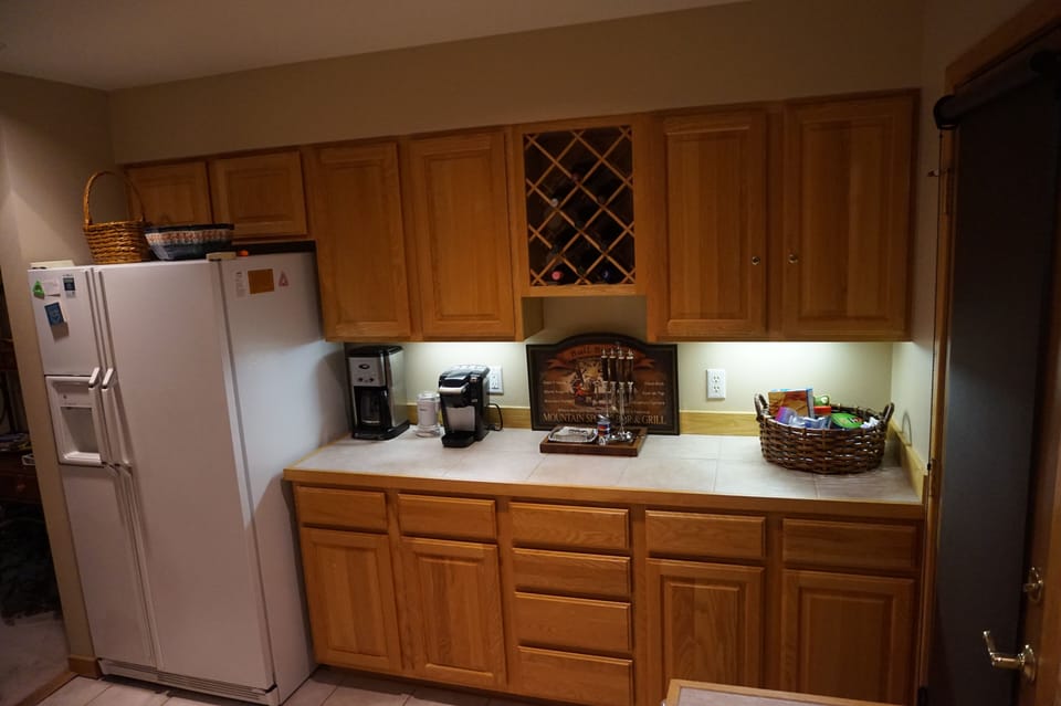 Buffet counter with 12-cup Drip and single Keurig Coffee Makers,  & wine storage