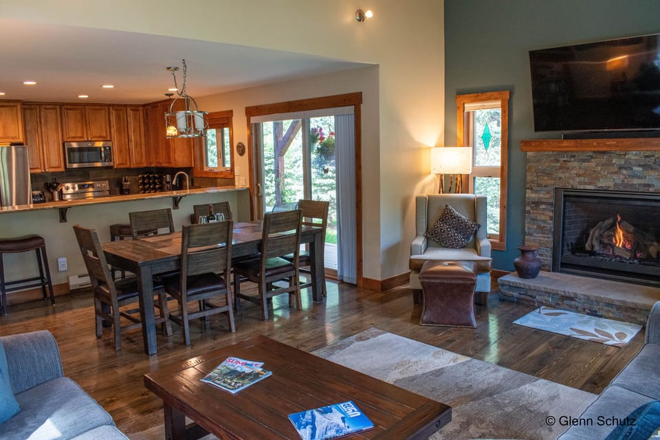 Wood floors with tasteful decor. TV with Roku.  Enter home on main level.
