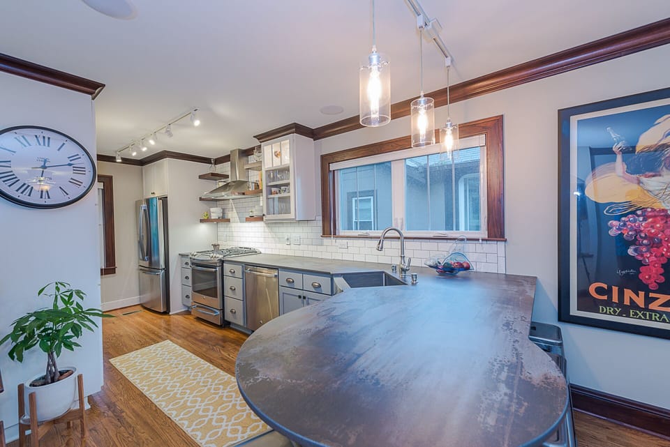 Brand new modern kitchen with gas range and espresso machine