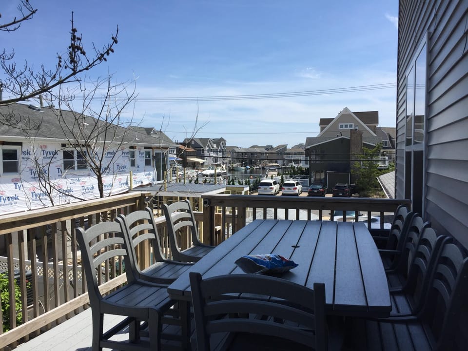 rear deck with bbq and some water views