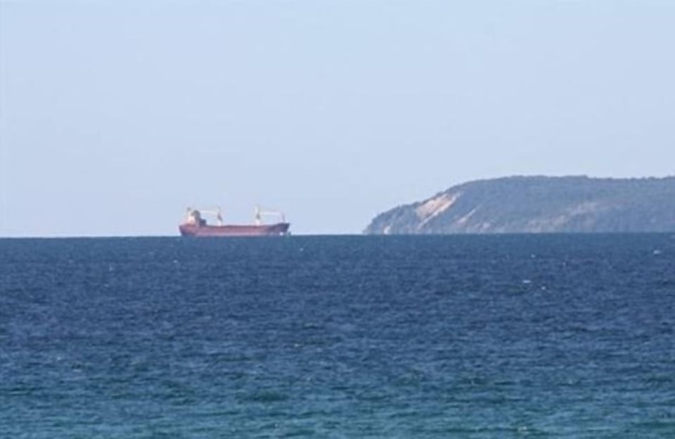 Get a closer look at freighters passing the Manitou Islands with our telescope