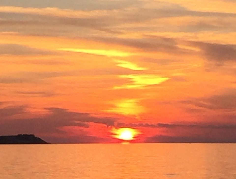 Beautiful sunsets from our deck or the beach